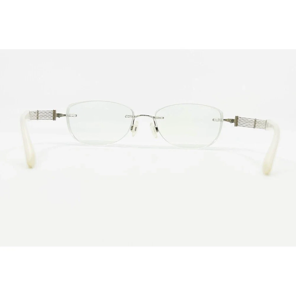 Charmant Line Art Eyeglasses Womens White Rimless Titan XL2040 53-16-135mm